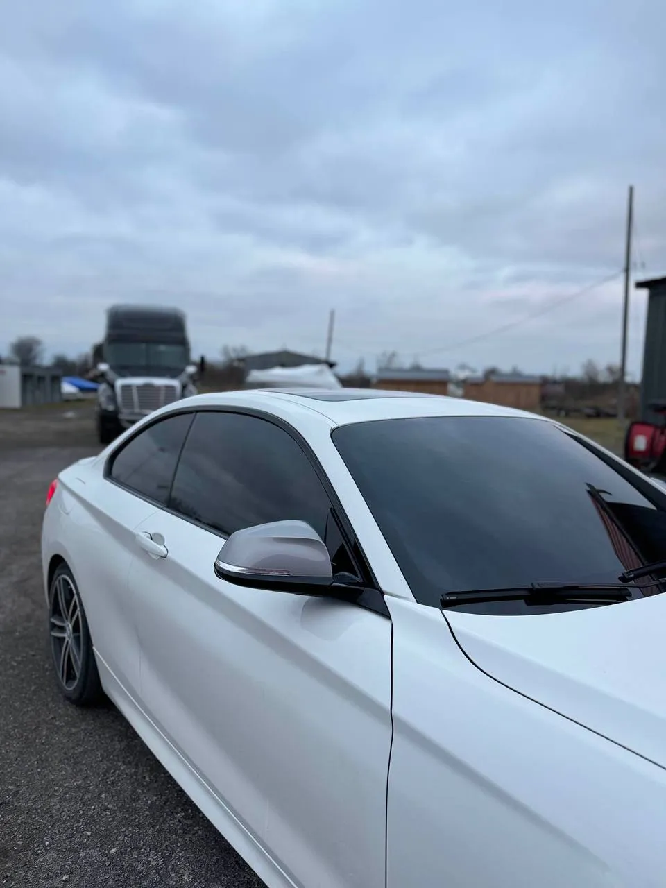 White Mercedes coupe with professional window tint
