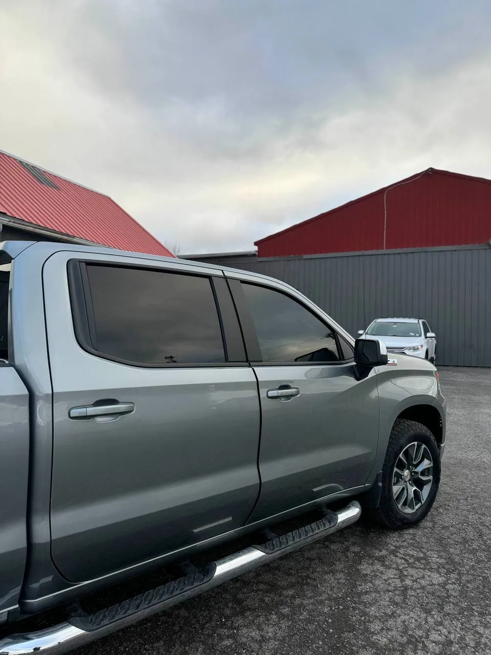 Gray Chevy Silverado with window tint