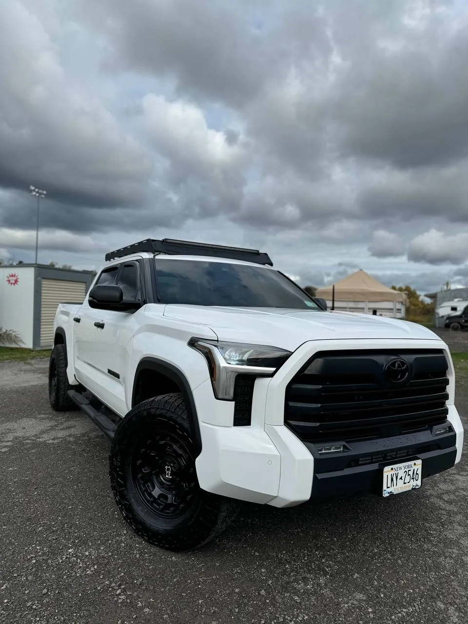 White Toyota Tundra rear view with tint