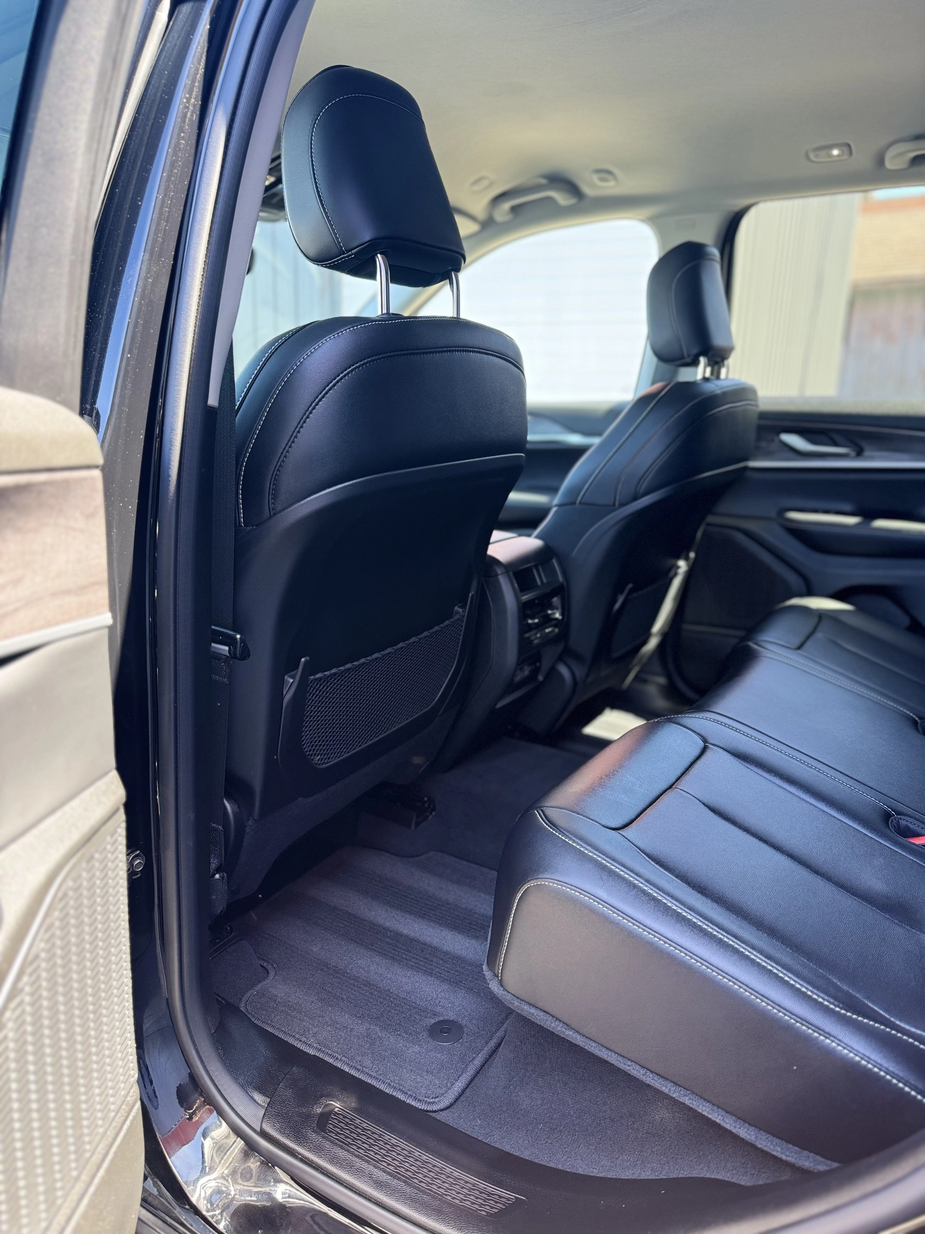 Clean car door panels and interior trim after professional detailing