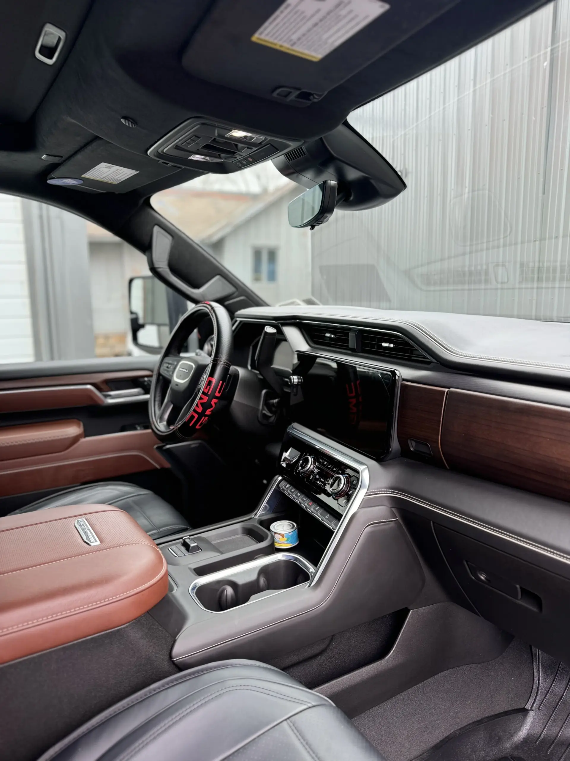 GMC Sierra Denali interior with wood trim after detailing