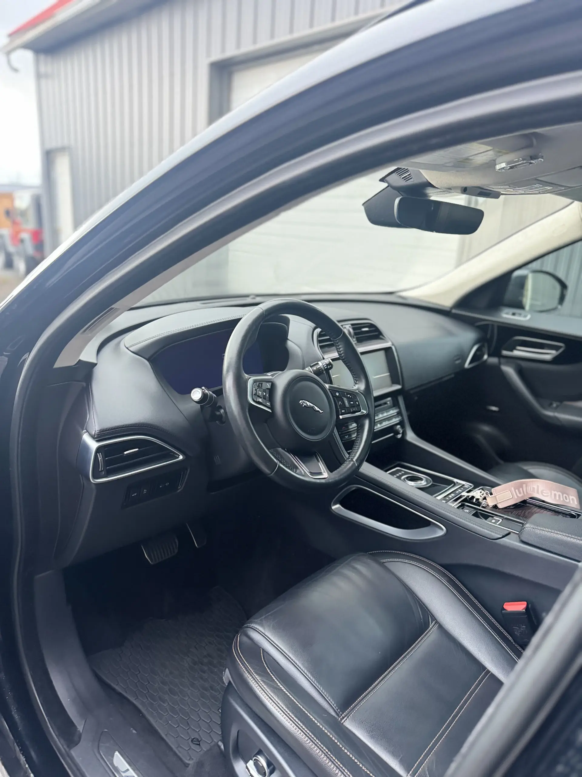 Jaguar F-PACE driver area after premium detailing