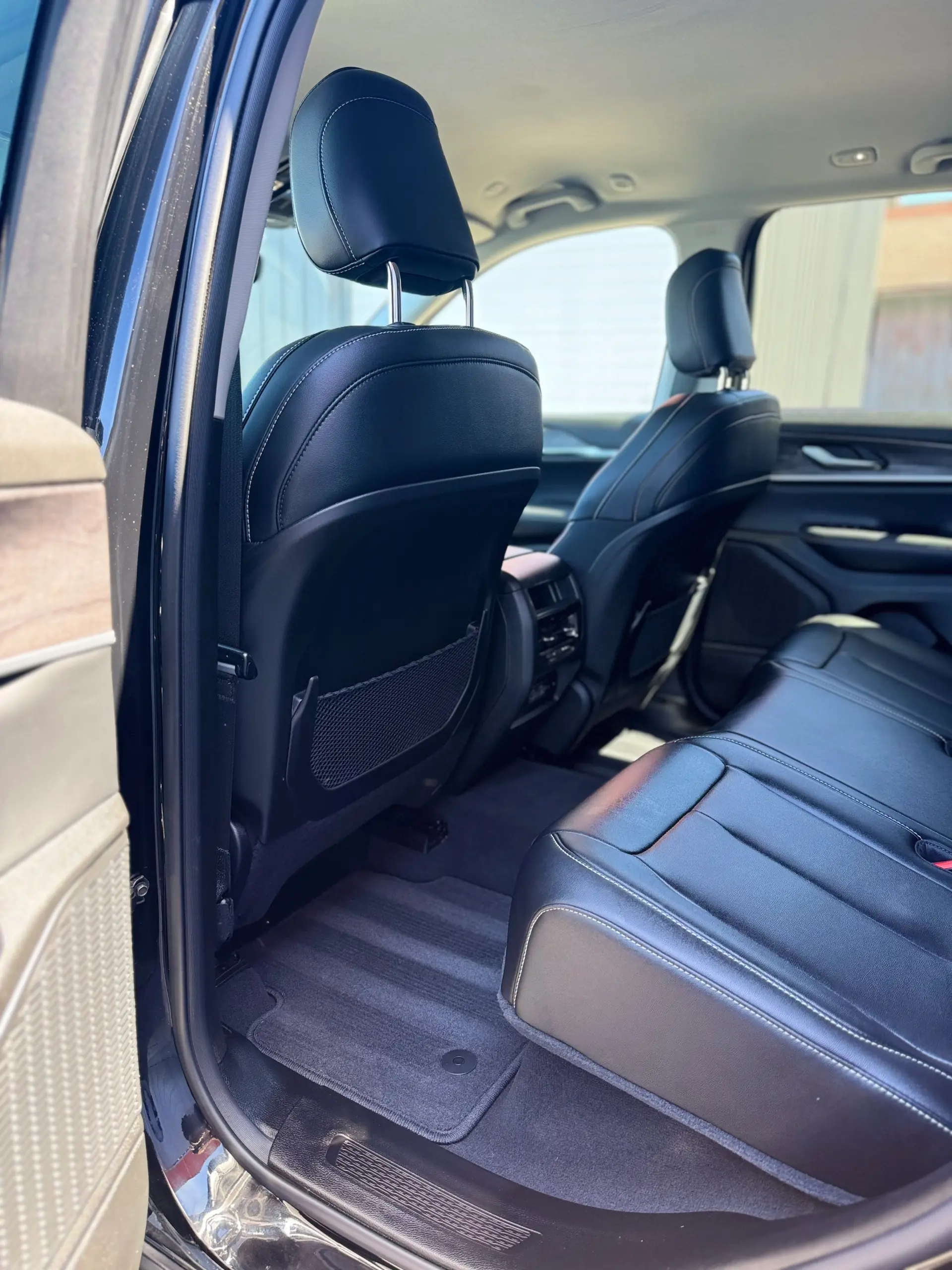 Clean car door panels and interior trim after professional detailing